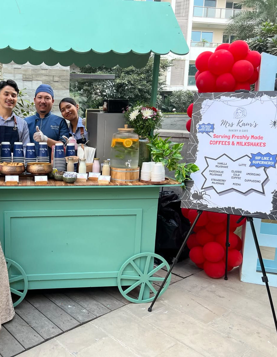 Mrs Kaur’s baristas and chef at a coffee and milkshake cart at an outdoor event