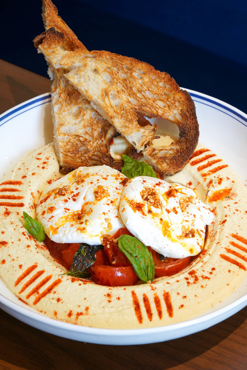 Hummus Eggs Levantine with sourdough at Mrs Kaur’s